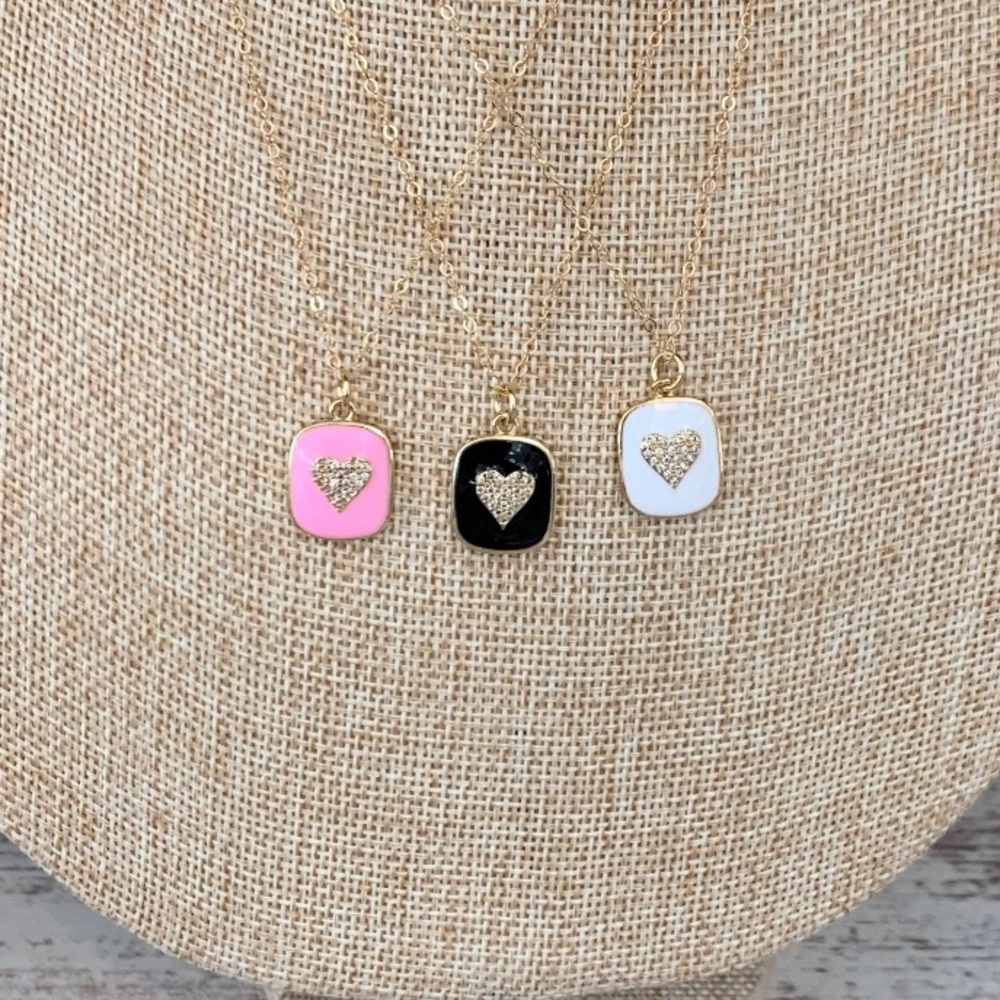 Black enamel heart necklace.